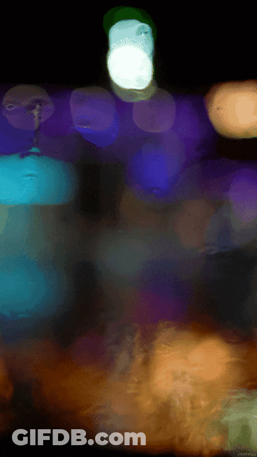 Rainy Night Circular Lights GIF