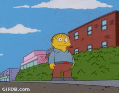 Ralph From The Simpsons Standing On Sidewalk GIF