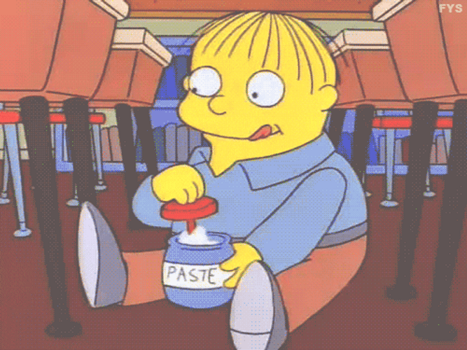 Ralph Wiggum Sitting On The Floor Eating Paste GIF