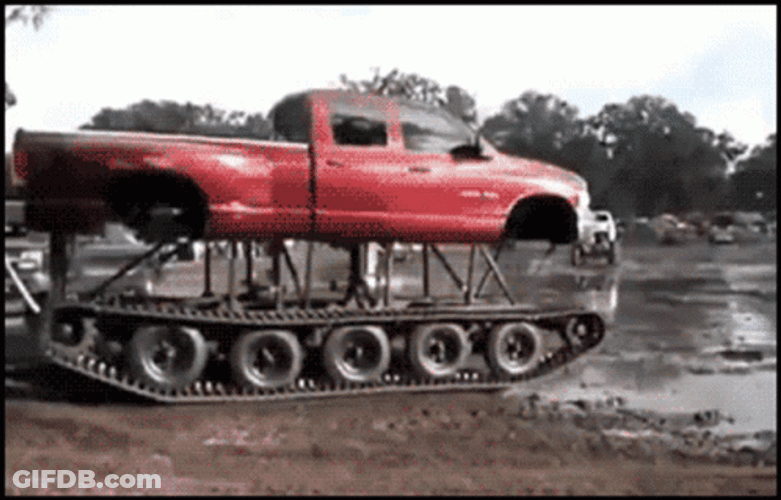 Ram Pick Up Truck Plowing Mud GIF