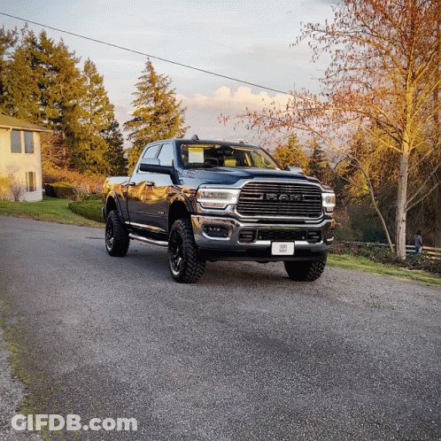 Ram Truck Parked On Gravel Road GIF