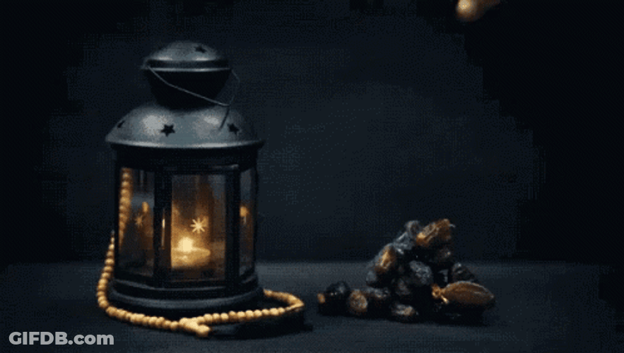 Ramadan Mubarak Lamp And Hand Picking Stone GIF