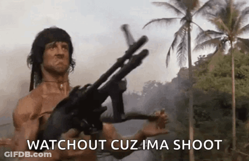 Rambo Holding Gun Saying Watchout Cuz Ima Shoot GIF