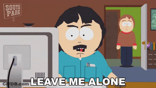 Randy From South Park Is Sitting In Front Of A Computer With The Words Leave Me Alone Below Him GIF