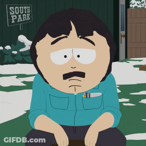 Randy Marsh Sitting In Front Of South Park Sign GIF