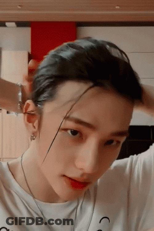 Rapper Hyunjin Tying Up Hair GIF