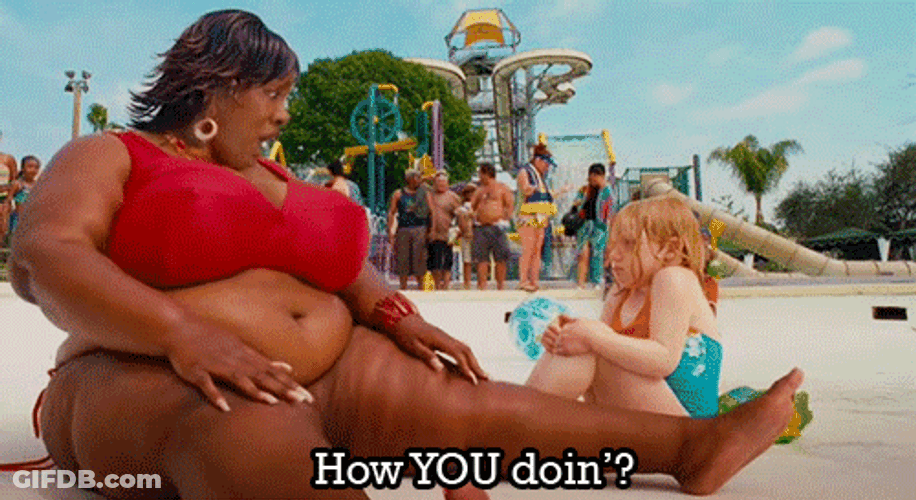 Rasputia In Bikini At The Beach Talking To Kid GIF