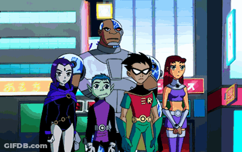 Raven And Robin Standing In Front Of Building GIF