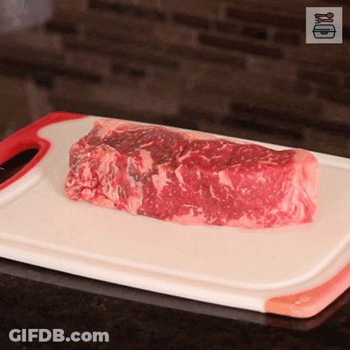 Raw Meat On White Cutting Board GIF