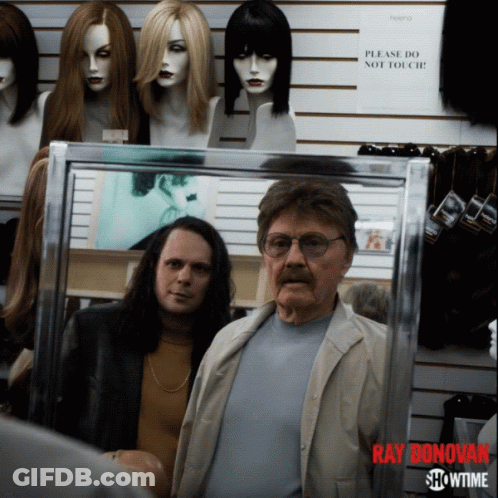 Ray Donovan Poster With Two Men In Mirror GIF