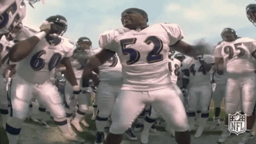 Ray Lewis In Middle Of Teammates GIF