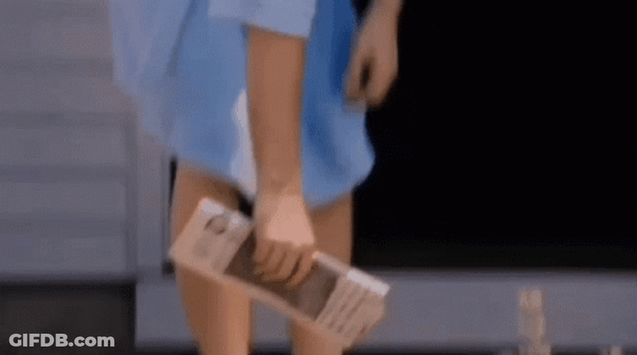 Ray Liotta Picking Up Newspaper GIF