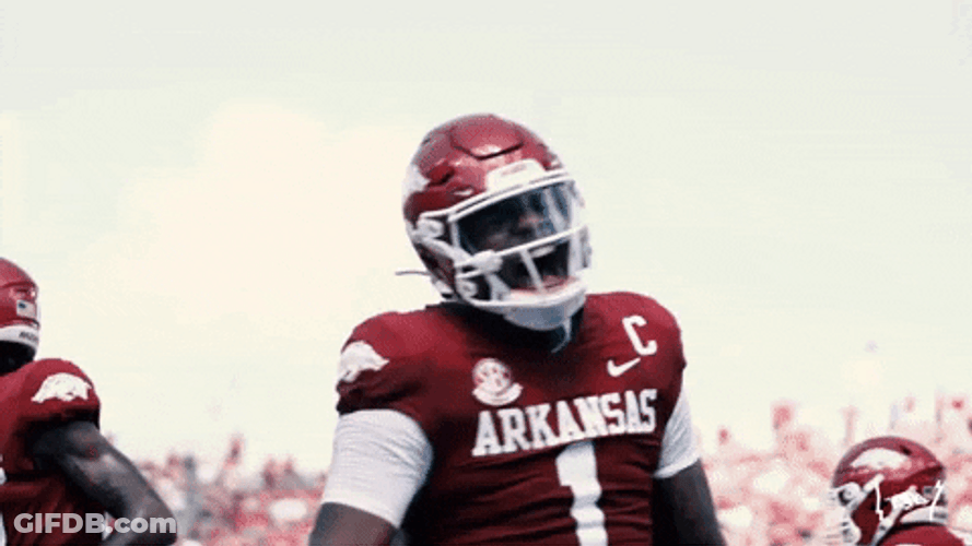 Razorbacks Player Smiling With Teammate GIF