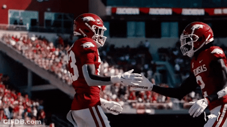 Razorbacks Players Doing Handshake GIF
