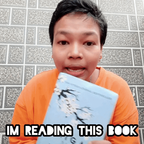 Reading Book Shows Cover Page GIF