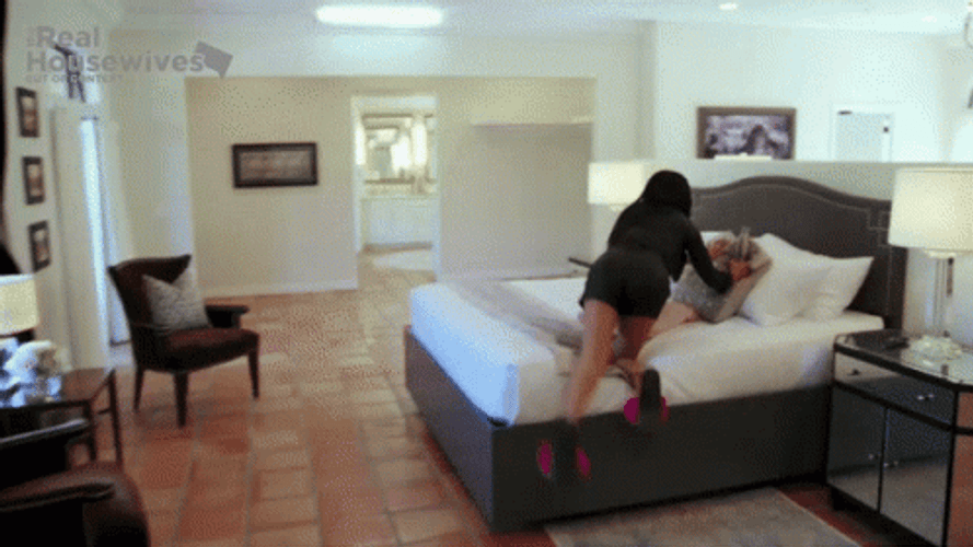 Real Housewives Roll In Bed GIF