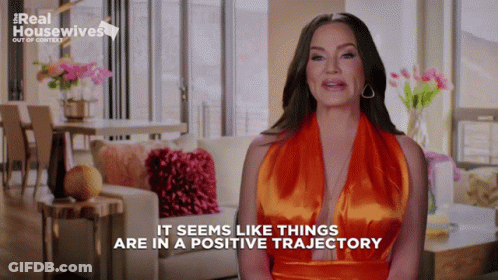 Real Housewives Woman In Orange Dress GIF