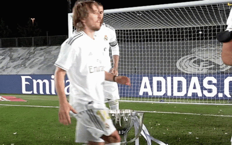 Real Madrid Mudric And Ramos Pose With Trophy GIF