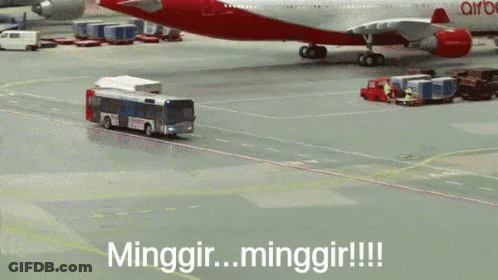 Red Airbus Towed By Bus On Tarmac GIF