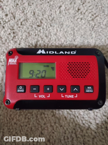Red And Black Midland Radio Displaying 9:20 GIF