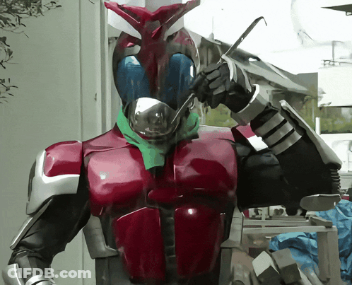 Red And Black Robot With Green Scarf GIF