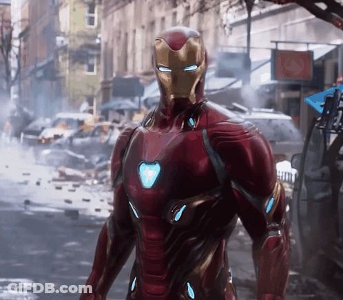 Red And Gold Iron Man Standing On Street GIF
