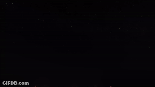 Red And Green Fireworks Display GIF