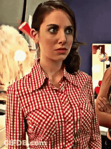 Red And White Checkered Shirt Woman Looking Camera GIF