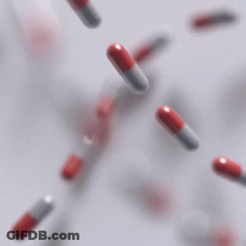 Red And White Pills Falling From Sky GIF