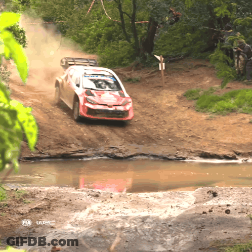 Red And White Rally Car With FIA GIF
