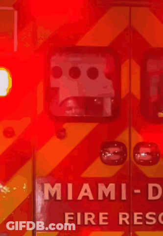 Red And Yellow Ambulance With Miami On Door GIF