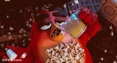 Red Angry Bird Eating Popcorn Holding Mustard GIF