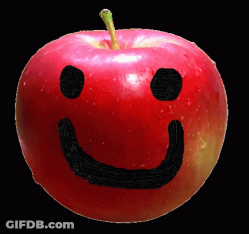 Red Apple With Black Face Drawn On It GIF
