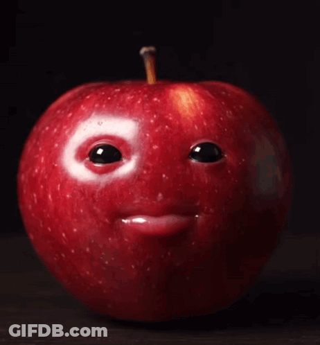 Red Apple With Face And Bite GIF