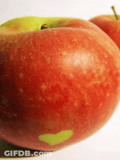 Red Apple With Green Heart Spot GIF