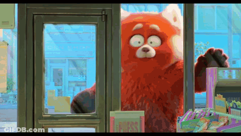 Red Bear Standing In Front Of Store Window GIF