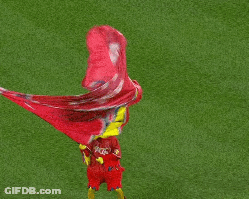 Red Bird Mascot Holding Red Flag GIF