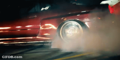 Red Car Doing Burnout With Smoke GIF