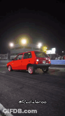 Red Car Driving At Night @Radialeroo GIF