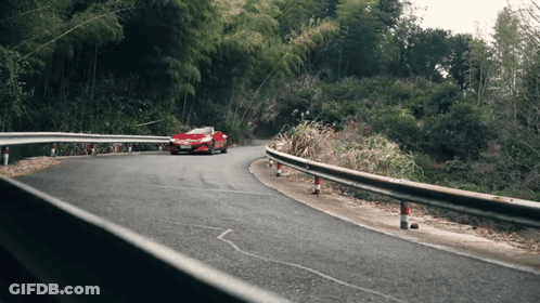 Red Car Driving Down Curvy Road GIF