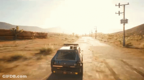 Red Car Driving Down Race Track With Houston Sign GIF