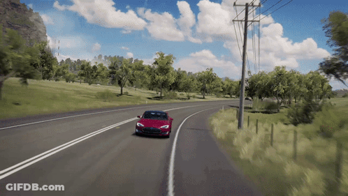 Red Car Driving Down Road With Trees GIF