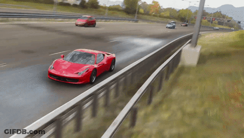 Red Car Driving On Highway Beside Fence GIF