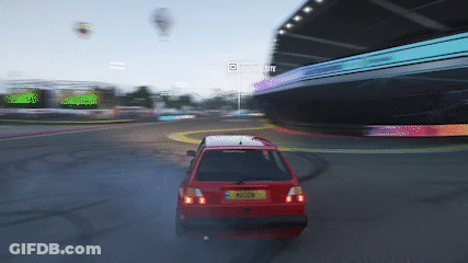 Red Car Driving On Race Track Saying Driving Elite GIF