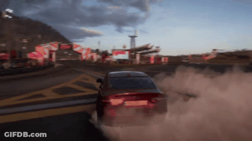 Red Car Driving With Tire Smoke GIF