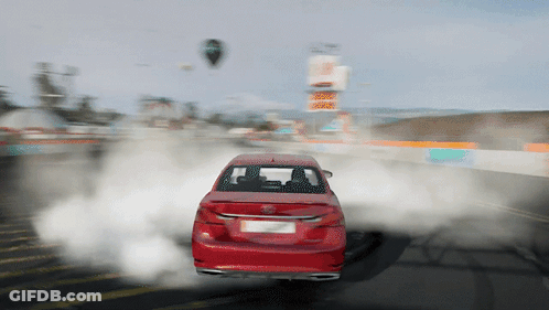 Red Car Driving With Tire Smoke GIF