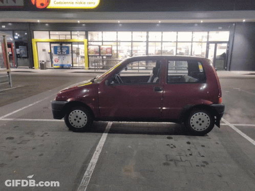 Red Car Parked At Codziennie Niskie Ceny GIF