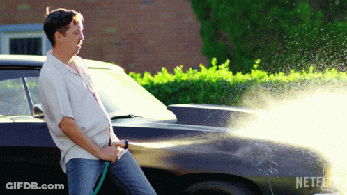 Red Car Parked In Parking Lot GIF