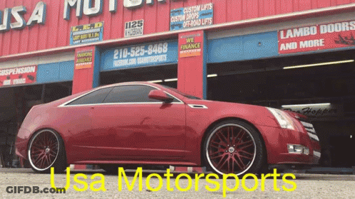 Red Car Parked Outside USA Motorsports GIF