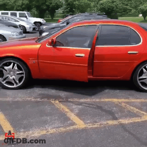 Red Car Parked With Adams GIF